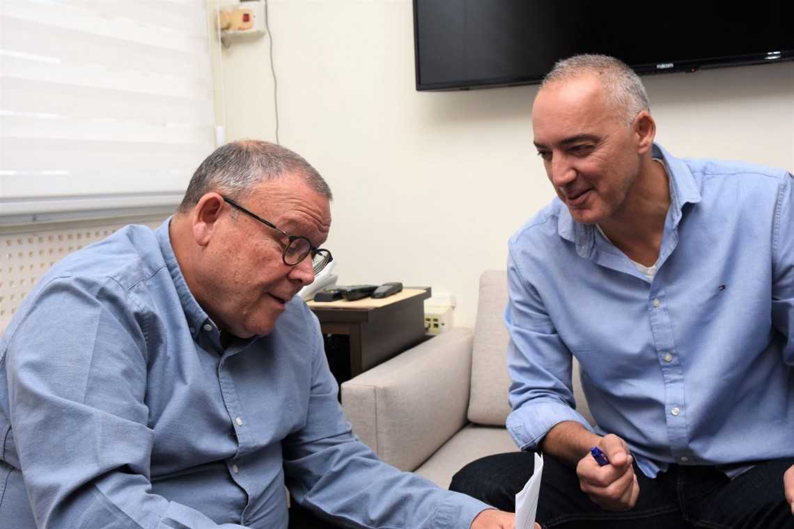יושב ראש ההסתדרות ארנון בר-דוד ומנכ"ל בזק און ליין אבי אטיאס