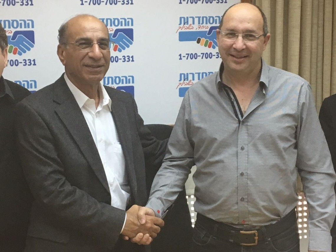 יו"ר ההסתדרות אבי ניסנקורן ויו"ר דירקטוריון הנמל סמי קצב